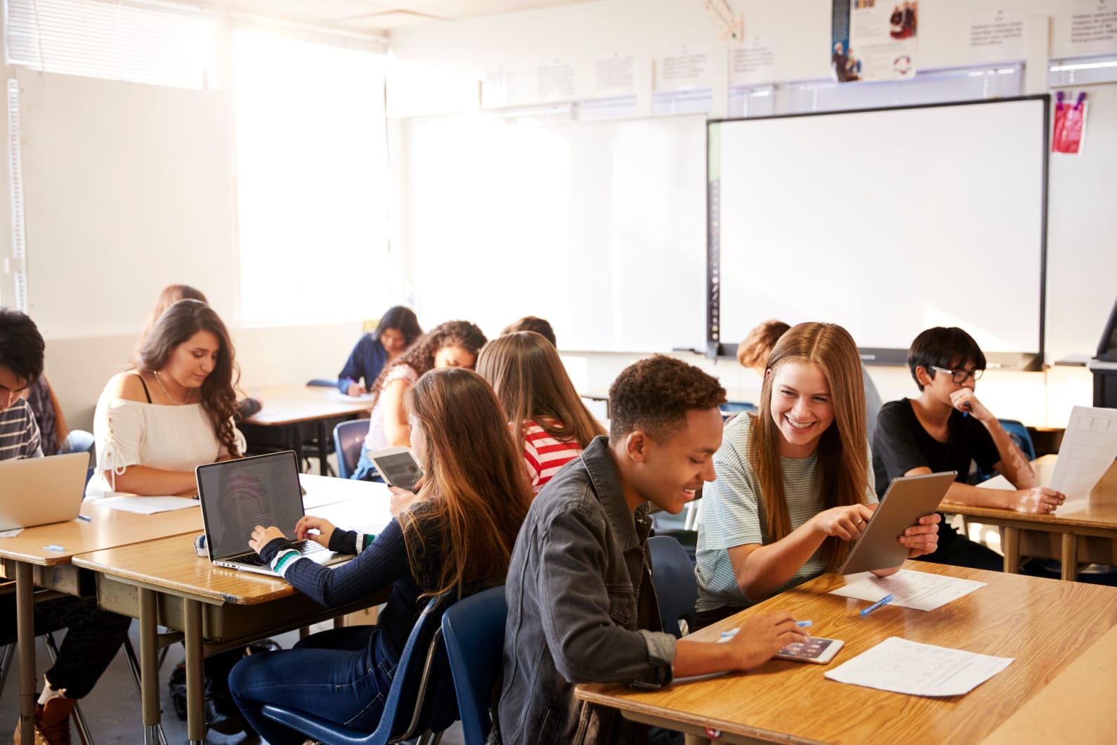 students in a classroom learning cooperatively