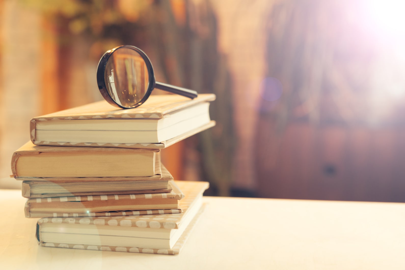 glasses sitting on a book