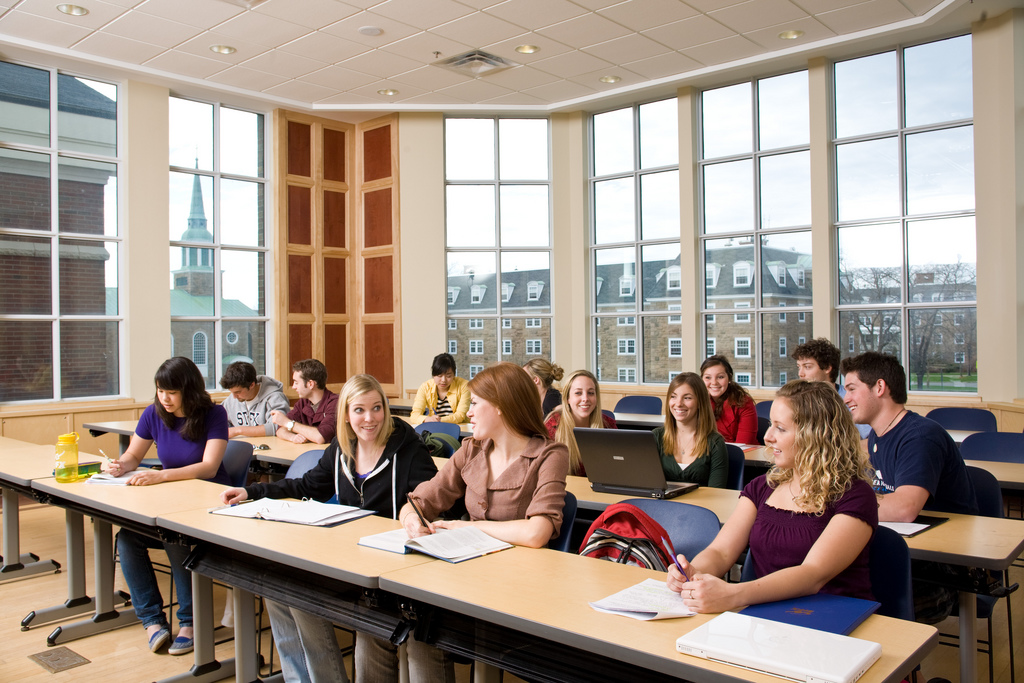 Students using laptops in the classroom