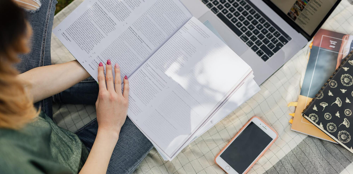 Student reading a text book