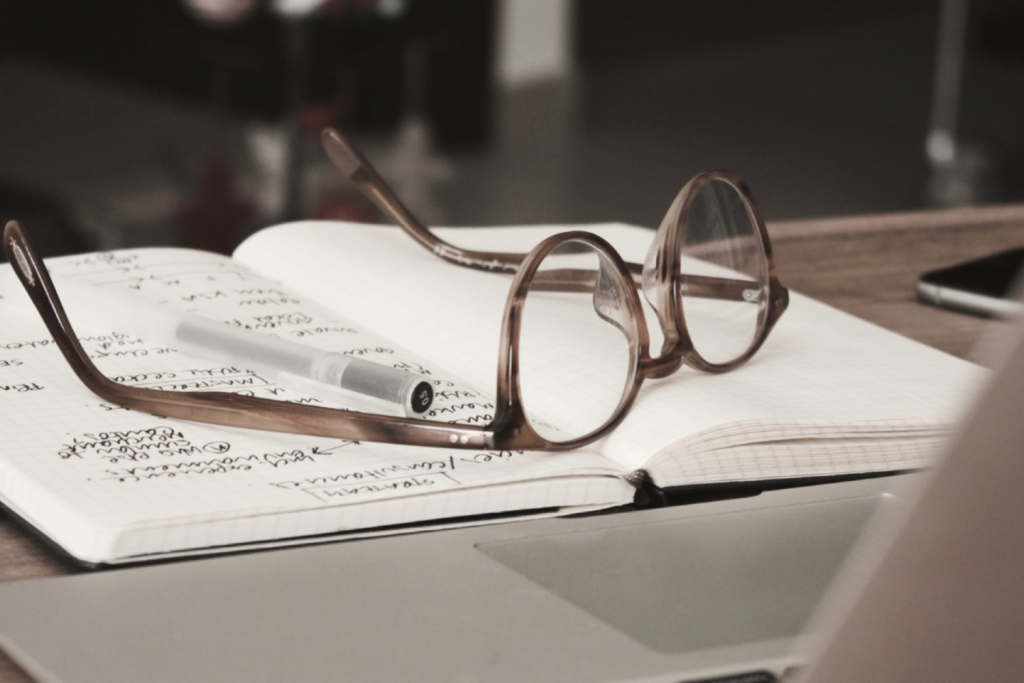 glassess on a book